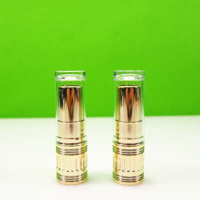 Empty golden lipstick tube case packaging